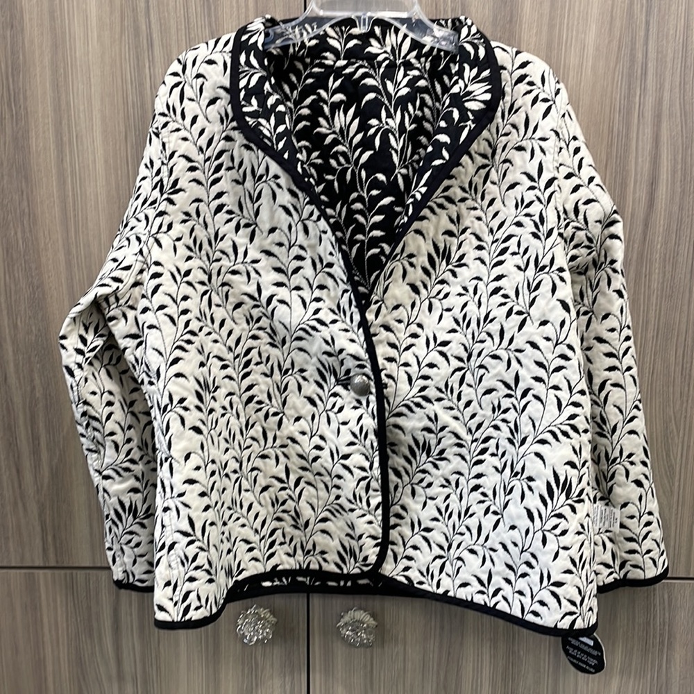 Trimdin Reversible jacket cream and black